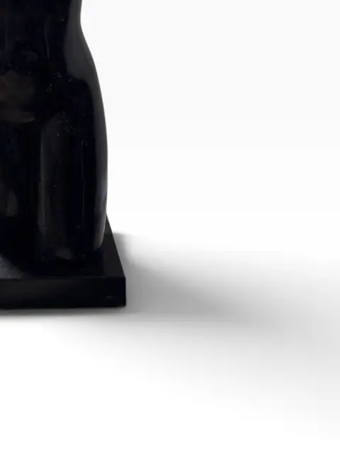 Black Marble Female Torso Sculpture with Raised Arm - detail