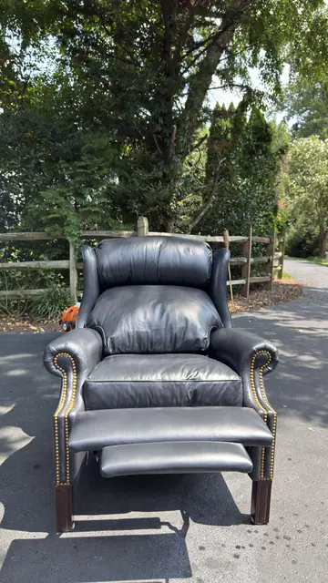 Traditional Leather Wingback Recliner Chair with Brass Nailhead Trim - detail