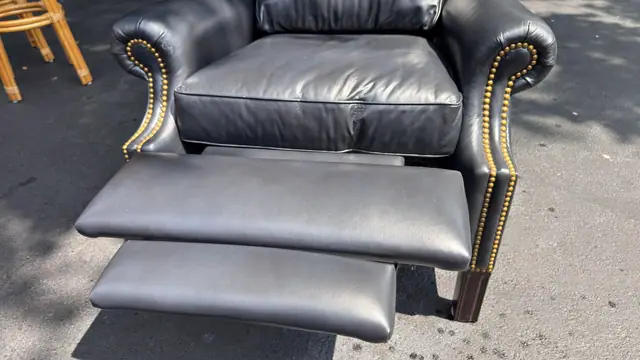 Traditional Leather Wingback Recliner Chair with Brass Nailhead Trim - detail